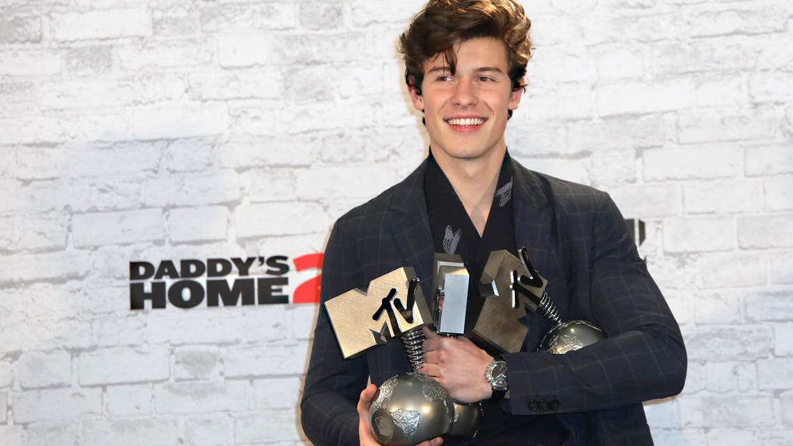 Singer Shawn Mendes poses for photographers with his awards for Best Song and Best Artist backstage at the MTV European Music Awards 2017 in London, Sunday, Nov. 12th, 2017. (AP)