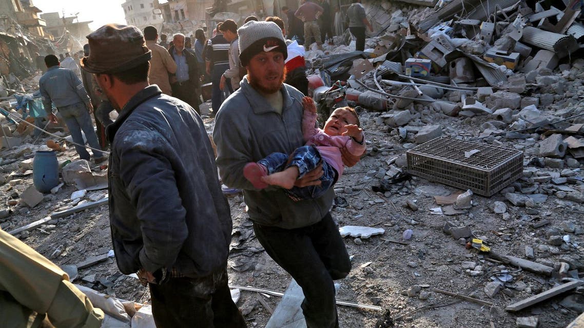Civil defense workers rushed alongside civilians to evacuate the injured, with one man in a thick beanie hat carrying a wailing child in a pink sweater away from the scene. (AFP)