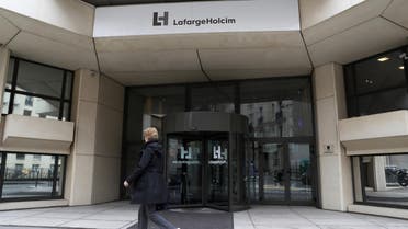 A picture taken on March 9, 2017, in Paris, shows the French headquarters of LafargeHolcim, a group created in 2015 by the merger of French cement manufacturer Lafarge and its Swiss counterpart Holcim. French-Swiss group LafargeHolcim is ready to sell its cement to build US President Donald Trump's controversial border wall, the company's CEO said in an interview. The wall Trump promised to erect along the US-Mexico border, valued at tens of billions of dollars, is at the center of a diplomatic crisis between Mexico City and Washington and is provoking criticism around the world.  Thomas SAMSON / AFP