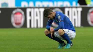 Italy's midfielder Jorginho reacts at the end of the FIFA World Cup 2018 qualification football match between Italy and Sweden, on November 13, 2017 at the San Siro stadium in Milan. Italy failed to reach the World Cup for the first time since 1958 on Monday as they were held to a 0-0 draw in the second leg of their play-off at the San Siro by Sweden, who qualified with a 1-0 aggregate victory. (AFP)