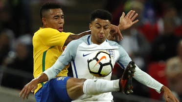Brazil's striker Gabriel Jesus (L) vies with England's midfielder Jesse Lingard during the international friendly football match between England and Brazil at Wembley Stadium in London on November 14, 2017.  Adrian DENNIS / AFP