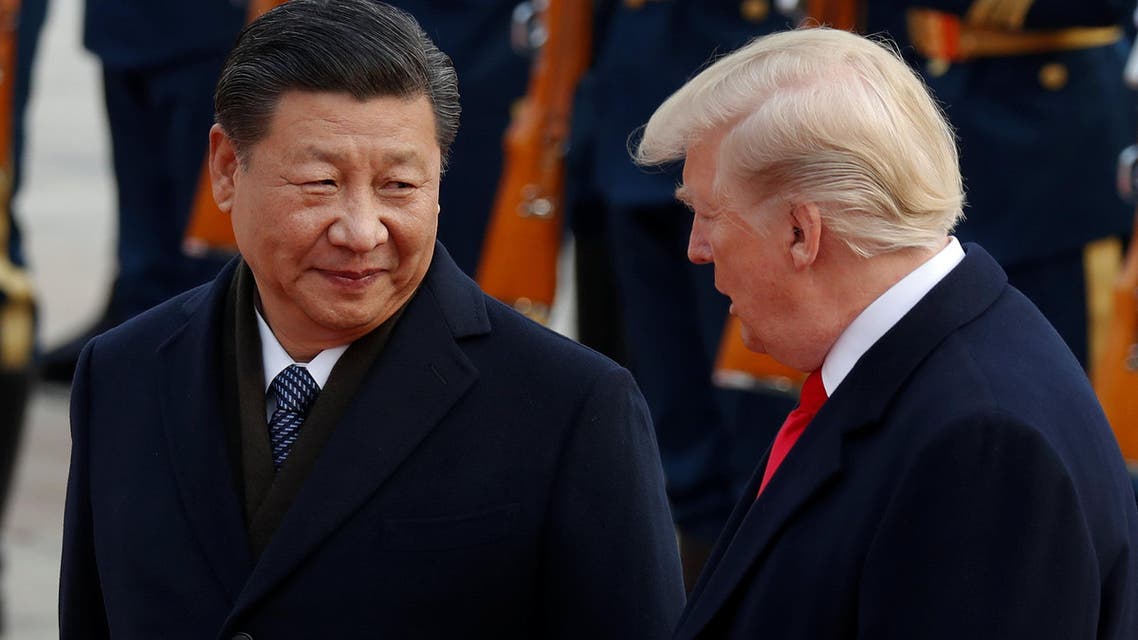 U.S. President Donald Trump takes part in a welcoming ceremony with China's President Xi Jinping at the Great Hall of the People in Beijing, China, November 9, 2017. REUTERS/Damir Sagolj