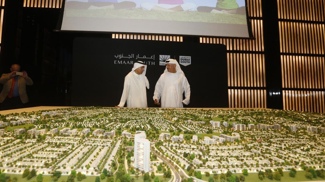 Chairman of Dubai Emaar Properties Mohamed Alabbar (L) during the unveiling of the plans for the construction of the new “Emaar South” development in Dubai on September 5, 2016. (AFP)