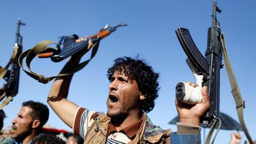 Houthi followers wave their weapons as they attend a rally to show support to the Palestinians in Sanaa, Yemen November 6, 2017. reuters