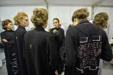 Models stand backstage during Louzan collection show as part of the Arab Fashion Week in Dubai on November 15, 2017. (AFP)
