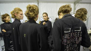 Models stand backstage during Louzan collection show as part of the Arab Fashion Week in Dubai on November 15, 2017. (AFP)