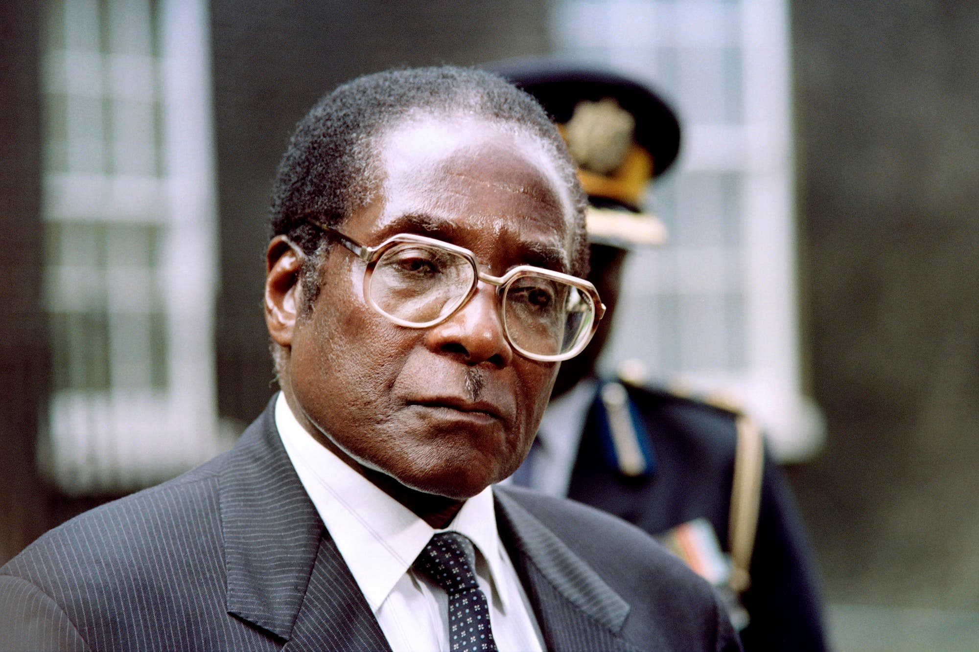 Mugabe answers the press after a meeting with British Prime Minister John Major in London on May 23, 1991. (AFP)