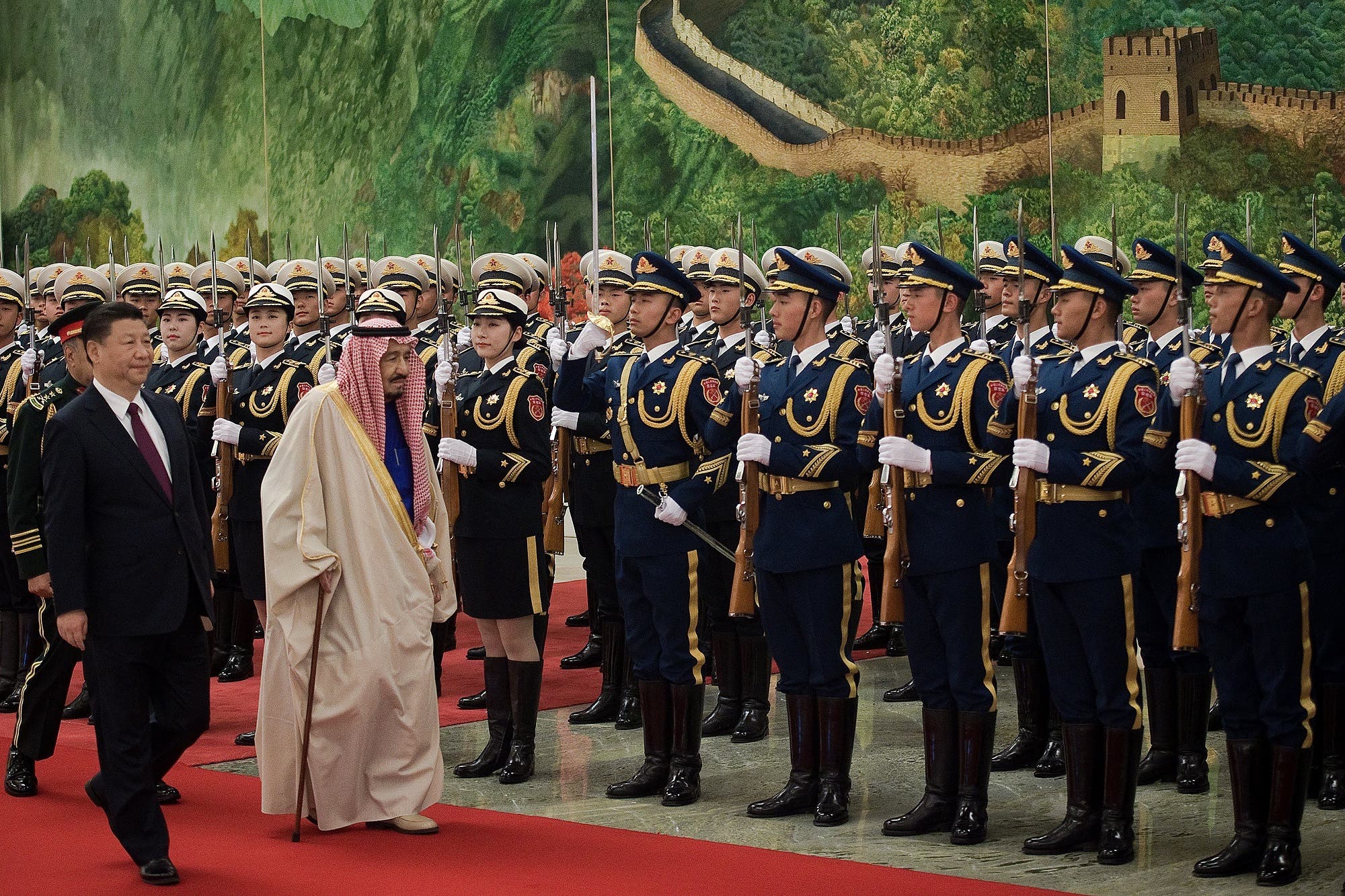 Saudi King Salman reviews an honor guard with Chinese President Xi Jinping (L) in Beijing on March 16, 2017. (AFP)