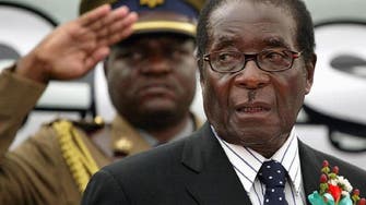Mugabe makes first public appearance amid talks on departure