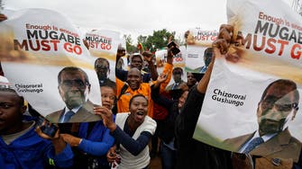 Giddy Zimbabweans gather in capital to march against Mugabe