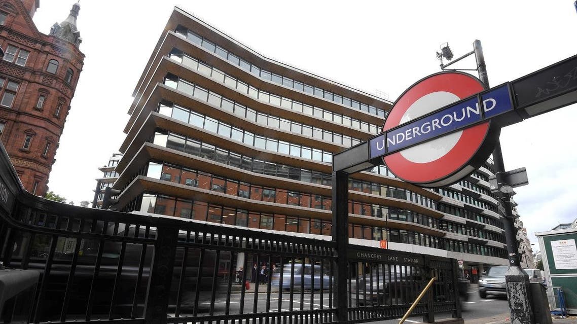 An office building containing the London headquarters of the PR company Bell Pottinger is seen behind an entrance to an underground train station in London. (Reuters)