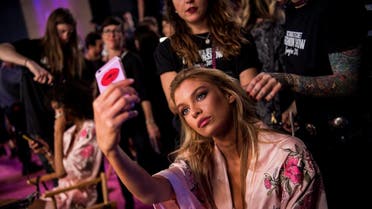 Stella Maxwell takes a selfie backstage before the start of the 2017 Victoria's Secret Fashion Show in Shanghai on November 20, 2017. (AFP)