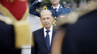 Michel Aoun during a welcome ceremony under the Arc de Triomphe in Paris on September 25, 2017. (AFP)