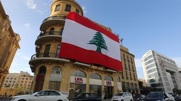 A Lebanese flag hangs from a building in downtown Beirut, Lebanon, November 21, 2017. REUTERS