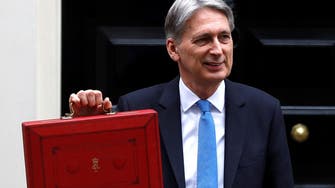 UK slashes growth forecasts, sees higher borrowing 