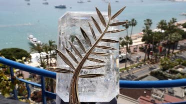 This file photo taken on May 24, 2017 shows the Palme d'Or trophy inlaid with diamonds which celebrates the 70th edition of the Cannes Film Festival at the Grand Hyatt Cannes Hotel Martinez in Cannes, southern France. (AFP)