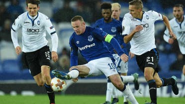 Everton’s Wayne Rooney (C) vies with Atalanta’s Marten de Roon (L) and Atalanta’s Timothy Castagne during the UEFA Europa League Group E football match in Liverpool on November 23, 2017. (AFP)