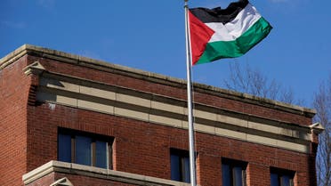 Palestinian flag waves at Palestine Liberation Organization office in Washington, U.S., November 19, 2017. U.S. State Department official said that under legislation passed by Congress, Secretary of State Rex Tillerson could not renew a certification that expired this month for the PLO office. REUTERS/Yuri Gripas