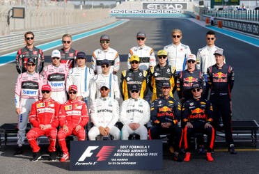 Formula One 2017 season drivers pose for end of season group photo during Abu Dhabi Grand Prix at Yas Marina Circuit on November 26, 2017. (Reuters) 