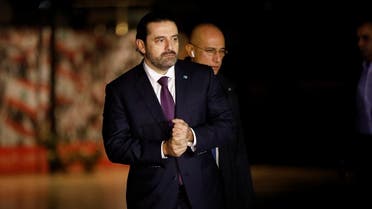 Saad al-Hariri, who announced his resignation as Lebanon's prime minister from Saudi Arabia, is seen at the grave of his father, assassinated former Lebanese prime minister Rafik al-Hariri. (Reuters)