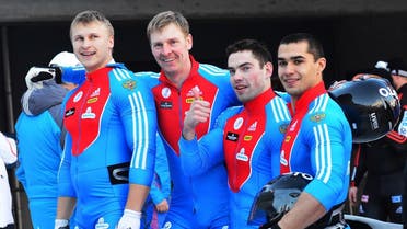 Russia's Alexey Negodaylo,Alexander Zubkov, Maxim Mokrousov and Dmitry Trunenkov , from left to right, pose for the media after winning four-man bobsled World Cup event at lake Koenigssee, Germany, Sunday, Jan. 13, 2013. (AP)