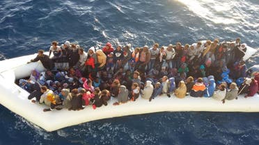 Migrants arrive at a naval base after they were rescued by the Libyan coastal guard in Tripoli, Libya November 23, 2017. Picture taken November 23, 2017. Media office of the Libyan Navy /Handout via REUTERS ATTENTION EDITORS - THIS IMAGE HAS BEEN SUPPLIED BY A THIRD PARTY.