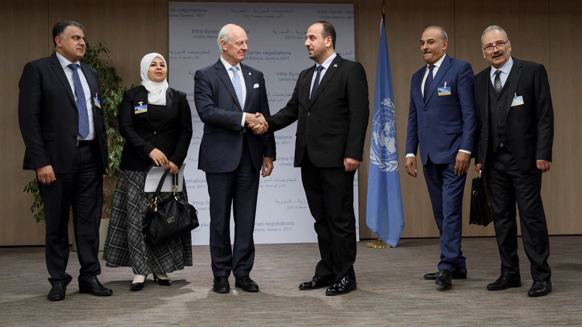 UN Special Envoy for Syria Staffan de Mistura (3rd L) shakes hands with head of the Syrian Negotiation Commission (SNC) Nasr al-Hariri (3rd R) next to opposition delegation members (from L-R) Khaled al-Mahamid, Hanadi Abu Arab, Jamal Suliman and Safwan Akash, on the opening of a new round of Syria's peace talks at the United Naitons Office in Geneva, Switzerland November 28, 2017. REUTERS/Fabrice Coffrini/Pool