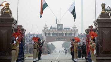 Pakistani Rangers and Indian Border Security Force personnel during the daily beating of the retreat ceremony at Wagah Border on October 30, 2017. (AFP)