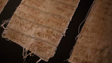 A mixture of blood and rust was used as ink to write on pieces of clothes. (Al Arabiya)