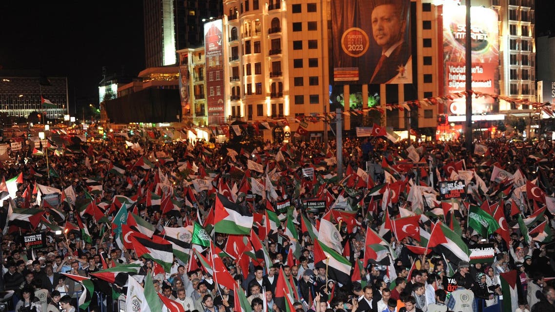 Turkish people take part in a rally on May 30, 2011 at Taksim Square in Istanbul, to mark the first anniversary of Mavi Marmara incident. (AFP)
