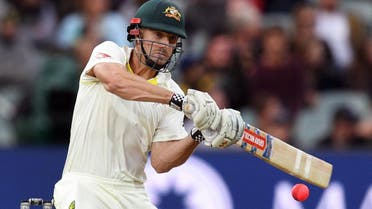 Australia’s batsman Shaun Marsh hits the ball to the boundary from the England bowling on the second day of the second Ashes cricket Test match in Adelaide in December 3, 2017. (AFP)