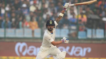 Indian batsman and team captain Virat Kohli (right) plays a shot during the second day of the third Test cricket match between India and Sri Lanka at the Feroz Shah Kotla Cricket Stadium in New Delhi on December 3, 2017. (AFP)