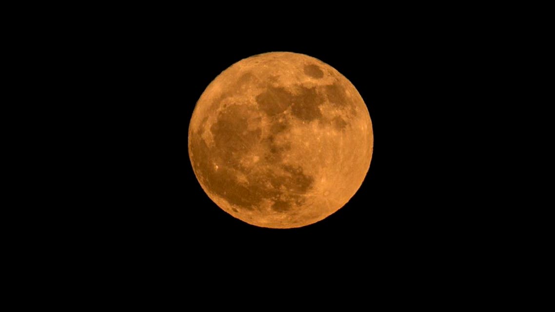 The lunar phenomenon occurs when a full moon is at its closest point to earth. (AFP)