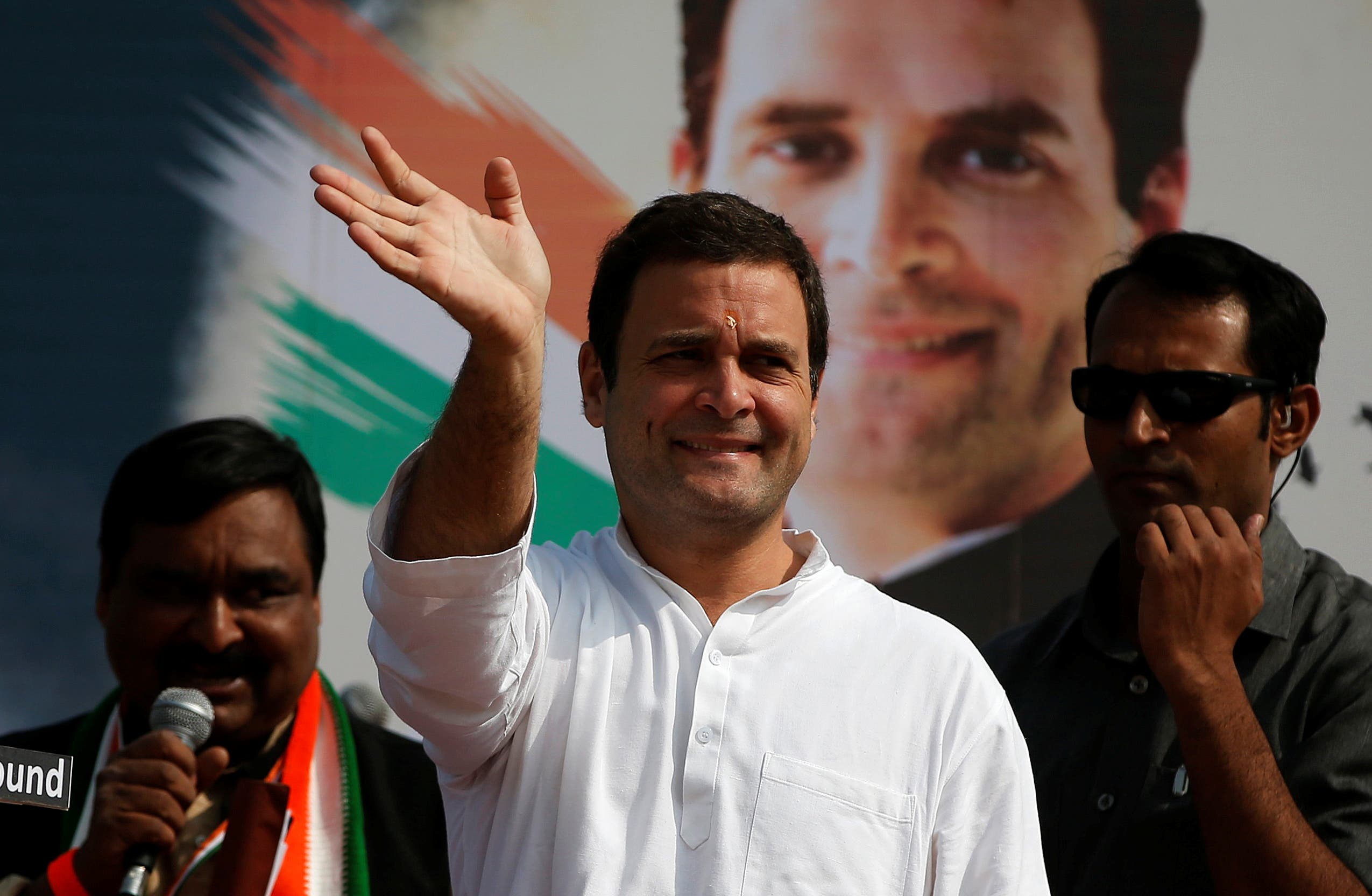 Rahul Gandhi waves to supporters during a rally ahead of Gujarat state assembly elections, on the outskirts of Ahmedabad, on November 11, 2017. (Reuters)