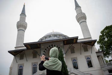 A woman takes a picture of Sehitlik mosque in Berlin, Germany, on August 18, 2015. (Reuters)
