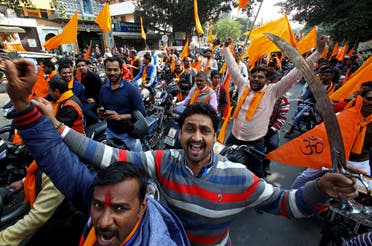 Members from Hindu hardline groups shout slogans to mark the 25th anniversary of the razing of Babri mosque in Chandigarh, on December 3, 2017. (Reuters)