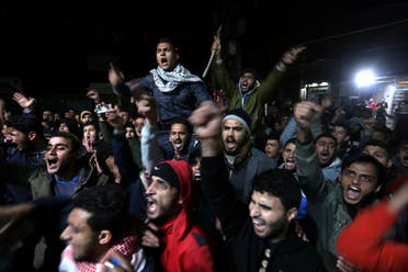 Palestinians react during a protest in Khan Younis in the southern Gaza Strip on December 6, 2017. (Reuters)