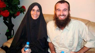 Freed hostages, Amanda Lindhout and Nigel Brennan, a freelance Australian photojournalist, in Mogadishu on November 26, 2009. (Reuters)