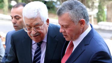 Jordan’s King Abdullah II welcomes Palestinian president Mahmud Abbas at the Royal Palace in Amman on December 7, 2017. (Reuters)