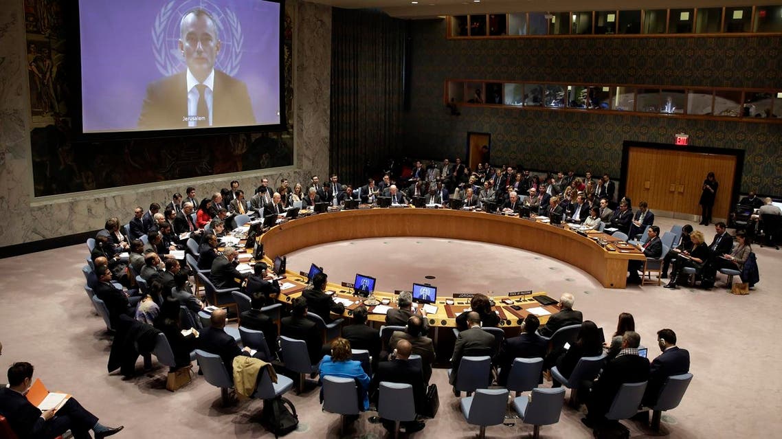United Nations Special Coordinator for the Middle East Peace Process Nikolay Mladenov, on screen, addresses the Security Council, from Jerusalem, at United Nations headquarters, Friday, Dec. 8, 2017. (AP)