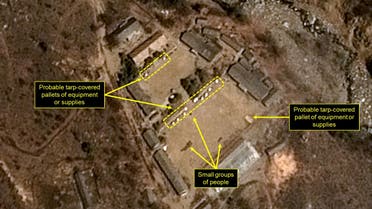 This handout picture obtained on April 13, 2017 from French space agency Centre national d'etudes spatiales (CNES - National Centre for Space Studies), Airbus Defense and Space and the 38 North analysis group, shows a satellite image taken on April 12, 2017 of North Korea's Punggye-ri Nuclear Test Site, with probable tarp-covered pallets and personnel in the Main Administrative Area. North Korea is ready to launch a nuclear test at its Punggye-ri Nuclear Test Site, the 38 North monitoring group reported on April 12, 2017. Commercial satellite imagery of North Korea’s Punggye-ri Nuclear Test Site from April 12 shows continued activity around the North Portal, new activity in the Main Administrative Area, and a few personnel around the site’s Command Center, the North Korea-related analysis website said.  HO / Airbus Defense & Space and 38 North / AFP