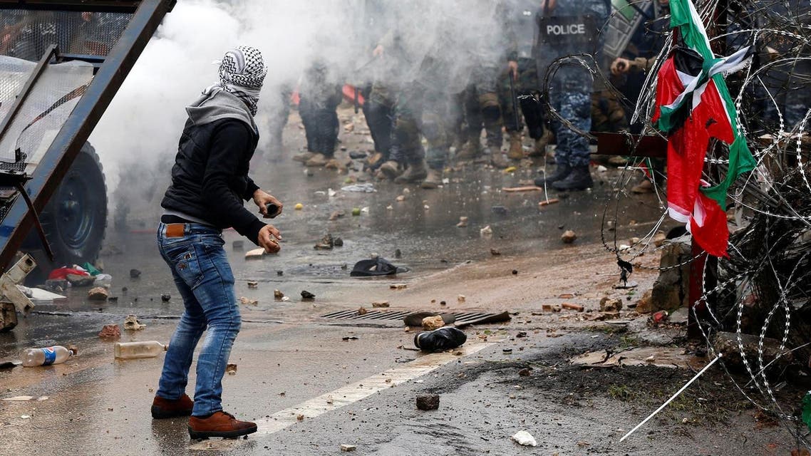 Protesters are seen near the U.S. embassy in Awkar, in Beirut, Lebanon December 10, 2017. (Reuters)