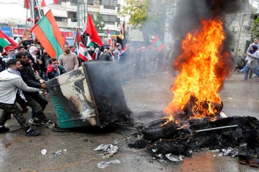 Protesters are seen near the U.S. embassy in Awkar, in Beirut, Lebanon December 10, 2017. (Reuters)