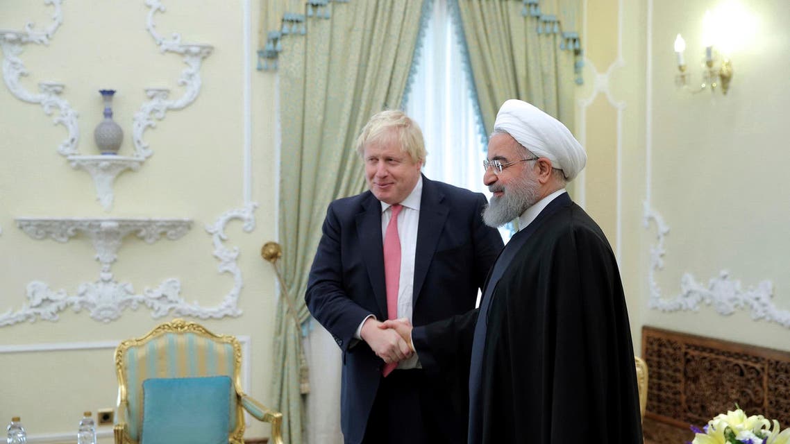 Boris Johnson and Iranian President Hassan Rouhani. (AP)