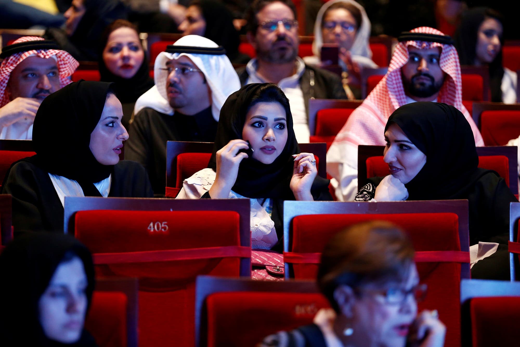 Saudi people watch the concert for composer Yanni during the concert at Princess Nourah bint Abdulrahman University in Riyadh on December 3, 2017. (Reuters)