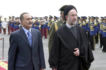 This file photo taken on May 15, 2003 shows Yemeni ex-president Ali Abdullah Saleh (L) welcoming former Iranian president Mohammad Khatami at Sanaa International Airport. (AFP)