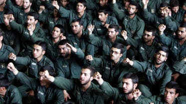 Iranian revolutionary guard corps chant slogans in Tehran on May 26, 2006. (Reuters)