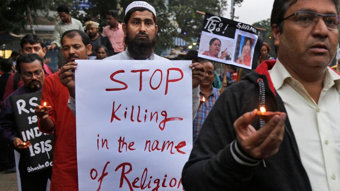 Human rights activists walk during a protest against the reported brutal killing of a Muslim laborer in Kolkata on Dec. 8, 2017. (AP)
