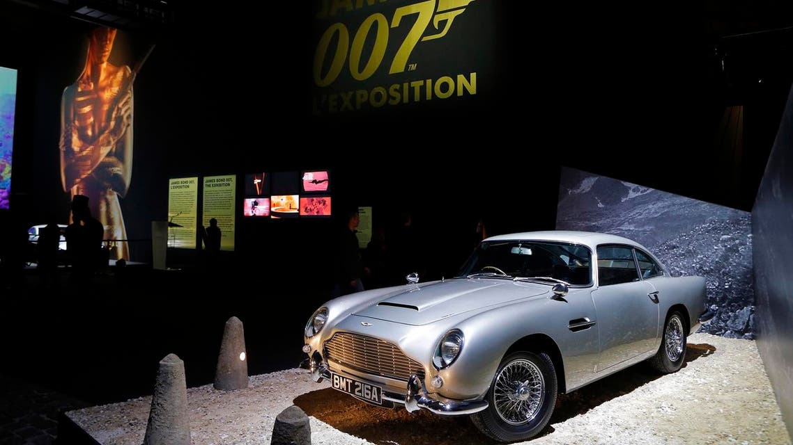 An Aston Martin DB5 from the James Bond film "Goldfinger" is displayed during a press presentation of the exhibition "The Designing 007: Fifty Years of Bond Style" at the Grande Halle de la Villette in Paris, France, Wednesday April 13, 2016. (AP)