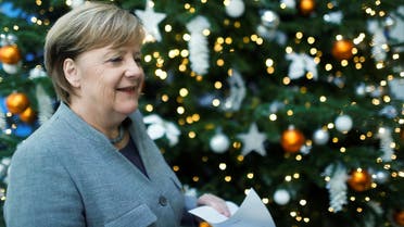 Acting German Chancellor Angela Merkel leaves after a news conference at the Christian Democratic Union (CDU) party headquarters in Berlin, Germany, December 18, 2017. (Reuters) 
